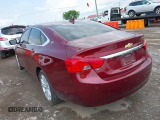 2016 Chevrolet Impala LT with VIN 2G1115S39G9205640, listed as a IAAI auction lot 42145225 with 131,765 mi miles and . Bid and sale history available at DreamBid. Image 3.