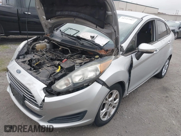 2016 Ford Fiesta SE with VIN 3FADP4BJ0GM121019, listed as a IAAI auction lot 41727967 with 87,725 mi miles and . Bid and sale history available at DreamBid. Image 6.