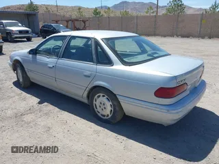 1994 Ford Taurus GL z VIN 1FALP52U2RG186625, wystawiony jako IAAI lot #42381964 z przebiegiem 54 020 mil mil oraz . Historia ofert i sprzedaży dostępna na DreamBid. Obrazek 3.