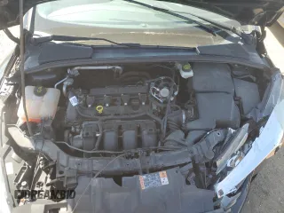 2017 Ford Focus SE z VIN 1FADP3F24HL316007, wystawiony jako Copart lot #56416645 z przebiegiem 79 085 mil mil oraz Szkoda całkowita • Salvage title. Historia ofert i sprzedaży dostępna na DreamBid. Obrazek 11.
