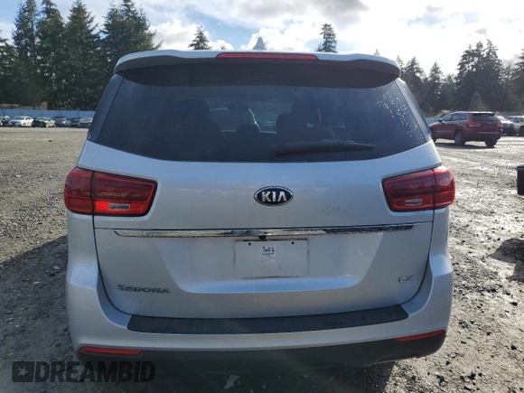 2021 Kia Sedona LX with VIN KNDMB5C14M6671364, listed as a Copart auction lot 48707495 with 58,661 mi miles and Salvage Title. Bid and sale history available at carsss.com. Image 6.