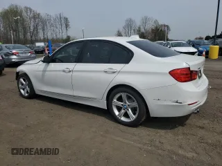 2015 BMW 3 Series 328i xDrive with VIN WBA3B5C53FF960590, listed as a Copart auction lot 54687145 with 54,520 mi miles and Salvage title. Bid and sale history available at DreamBid. Image 2.