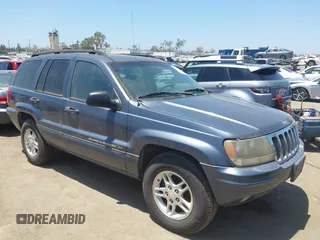 2002 Jeep Grand Cherokee Laredo z VIN 1J4GX48S22C265621, wystawiony jako IAAI lot #42530361 z przebiegiem 189 759 mil mil oraz . Historia ofert i sprzedaży dostępna na DreamBid. Obrazek 1.