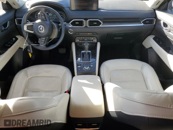 2021 Mazda CX-5 Grand Touring with VIN JM3KFBDM9M0490239, listed as a Copart auction lot 43306975 with 47,010 mi miles and Salvage Title. Bid and sale history available at carsss.com. Image 8.
