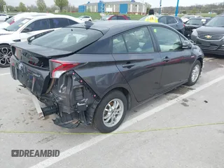 2018 Toyota Prius Two with VIN JTDKARFU7J3553216, listed as a IAAI auction lot 41979005 with 61,818 mi miles. Bid and sale history available at carsss.com. Image 4.
