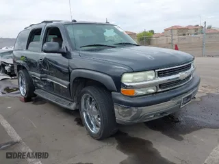 2004 Chevrolet Tahoe LT with VIN 1GNEK13T54J146851, listed as a IAAI auction lot 41990571 with 172,025 mi miles. Bid and sale history available at carsss.com. Image 1.