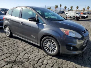 2015 Ford C-Max Energi SEL with VIN 1FADP5CU5FL121886, listed as a Copart auction lot 72168813 with 102,301 mi miles. Bid and sale history available at carsss.com. Image 4.