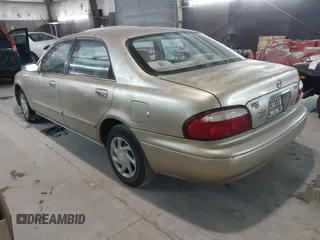 1999 Mazda 626 ES with VIN 1YVGF22C9X5823002, listed as a IAAI auction lot 41385617 with 149,127 mi miles. Bid and sale history available at carsss.com. Image 3.
