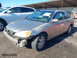 2003 Honda Civic EX with VIN 1HGEM22973L040324, listed as a IAAI auction lot 41807502 with 242,048 mi miles. Bid and sale history available at carsss.com. Image 2.
