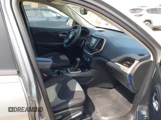 2015 Jeep Cherokee Sport with VIN 1C4PJLAB2FW696010, listed as a IAAI auction lot 42032956 with 88,323 mi miles. Bid and sale history available at carsss.com. Image 5.