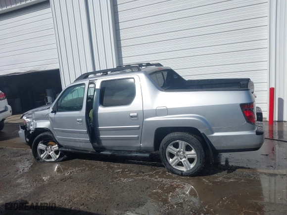 2014 Honda Ridgeline RTL with VIN 5FPYK1F51EB012843, listed as a IAAI auction lot 41629002 with 114,761 mi miles. Bid and sale history available at carsss.com. Image 14.