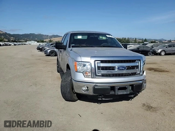 2014 Ford F-150 XL with VIN 1FTFW1EF5EKE57295, listed as a Copart auction lot 61687195 with 123,852 mi miles and Salvage title. Bid and sale history available at DreamBid. Image 13.