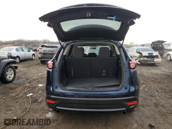 2017 Mazda CX-9 Sport with VIN JM3TCABY9H0142833, listed as a Copart auction lot 46862965 with 63,537 mi miles and Salvage Title. Bid and sale history available at DreamBid. Image 6.