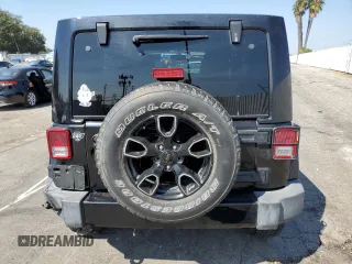 2018 Jeep Wrangler JK Unlimited Altitude with VIN 1C4BJWEG5JL820816, listed as a Copart auction lot 71212614 with 76,630 mi miles and Salvage Title. Bid and sale history available at carsss.com. Image 6.