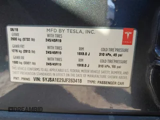 2018 Tesla Model S 75D with VIN 5YJSA1E29JF263418, listed as a IAAI auction lot 41682037 with 84,764 mi miles and . Bid and sale history available at DreamBid. Image 9.