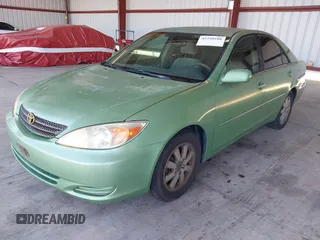 2002 Toyota Camry LE z VIN 4T1BE30K02U096796, wystawiony jako IAAI lot #42230108 z przebiegiem 249 883 mil mil oraz . Historia ofert i sprzedaży dostępna na DreamBid. Obrazek 2.
