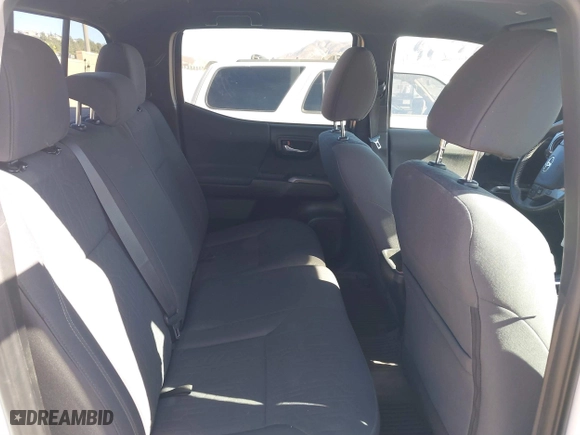 2019 Toyota Tacoma 4WD SR5 with VIN 3TMDZ5BN1KM079305, listed as a IAAI auction lot 41247804 with 98,494 mi miles. Bid and sale history available at carsss.com. Image 8.