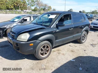2005 Hyundai Tucson GLS with VIN KM8JN72D55U058390, listed as a IAAI auction lot 41420416 with 197,993 mi miles. Bid and sale history available at carsss.com. Image 17.