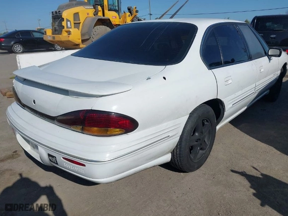 1999 Pontiac Bonneville SE with VIN 1G2HX52KXXH254051, listed as a IAAI auction lot 41990245 with 213,000 mi miles. Bid and sale history available at carsss.com. Image 4.