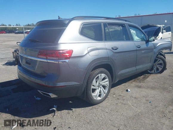 2021 Volkswagen Atlas SE with VIN 1V2WR2CA3MC602149, listed as a IAAI auction lot 41845288 with 59,941 mi miles and . Bid and sale history available at DreamBid. Image 4.