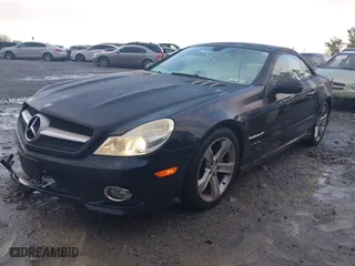 2009 Mercedes-Benz SL-Class V8 with VIN WDBSK71F29F143653, listed as a IAAI auction lot 41310556 with 115,377 mi miles. Bid and sale history available at carsss.com. Image 19.