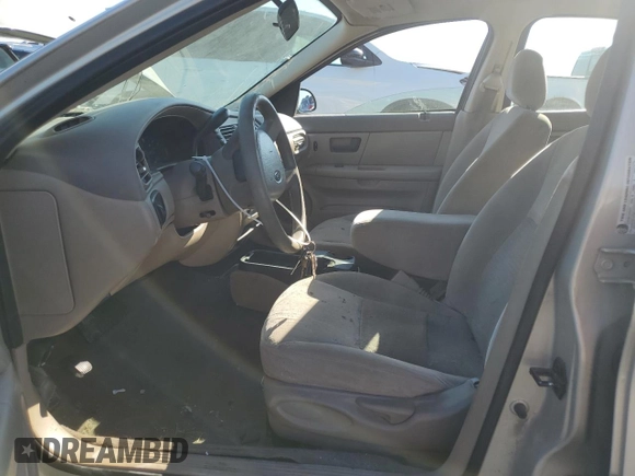 2006 Ford Taurus SE с VIN 1FAFP53U76A221489, выставлен на аукционе Copart как лот 72615374 с пробегом Не указан миль и Списание • Salvage title. История ставок и продаж доступна на DreamBid. Изображение 7.