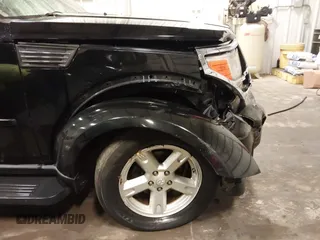 2007 Dodge Nitro SXT with VIN 1D8GU28K67W663621, listed as a IAAI auction lot 41691529 with 211,556 mi miles. Bid and sale history available at carsss.com. Image 19.