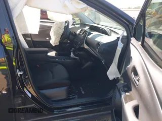 2022 Toyota Prius L Eco with VIN JTDKAMFU1N3182790, listed as a IAAI auction lot 41993264 with 124,777 mi miles and . Bid and sale history available at DreamBid. Image 5.