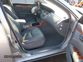 2005 Toyota Avalon XL z VIN 4T1BK36B75U044022, wystawiony jako IAAI lot #41330241 z przebiegiem 196 362 mil mil oraz . Historia ofert i sprzedaży dostępna na DreamBid. Obrazek 5.