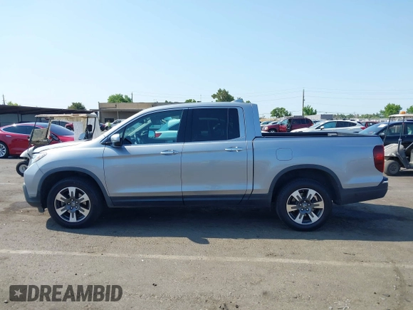 2019 Honda Ridgeline RTL-E with VIN 5FPYK3F79KB029771, listed as a IAAI auction lot 42448369 with 90,142 mi miles and . Bid and sale history available at DreamBid. Image 14.