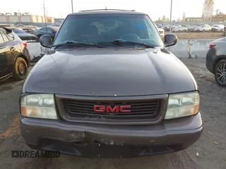 1998 GMC Jimmy SL with VIN 1GKCS13W1W2562133, listed as a IAAI auction lot 41159010 with 277,799 mi miles. Bid and sale history available at carsss.com. Image 12.