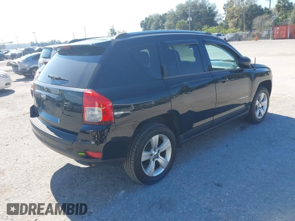 2013 Jeep Compass Sport with VIN 1C4NJDBB1DD217533, listed as a IAAI auction lot 41461759 with 205,972 mi miles. Bid and sale history available at carsss.com. Image 4.