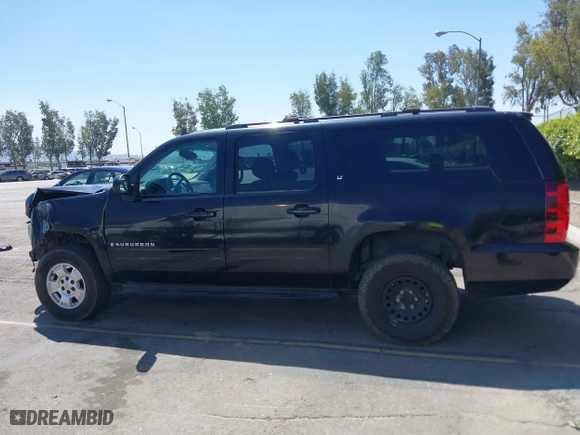 2009 Chevrolet Suburban LT w/1LT with VIN 1GNFK26369R272487, listed as a IAAI auction lot 42024066 with 48,709 mi miles. Bid and sale history available at carsss.com. Image 15.