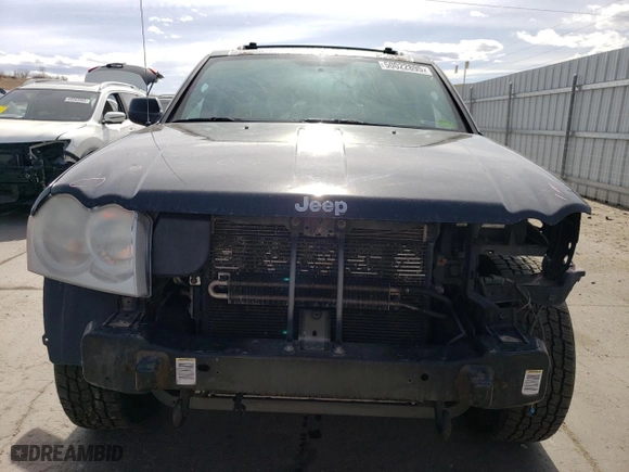 2007 Jeep Grand Cherokee Laredo with VIN 1J8HR48P67C698021, listed as a Copart auction lot 50022895 with 176,120 mi miles and Salvage Title. Bid and sale history available at carsss.com. Image 5.
