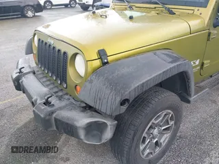 2007 Jeep Wrangler Unlimited X with VIN 1J8GB39107L114510, listed as a IAAI auction lot 41736367 with 467,567 mi miles and . Bid and sale history available at DreamBid. Image 6.