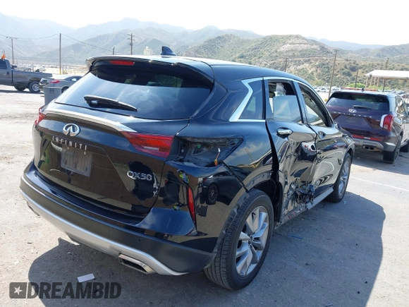 2022 Infiniti QX50 Pure z VIN 3PCAJ5AA4NF107602, wystawiony jako IAAI lot #42147112 z przebiegiem 60 872 mil mil oraz . Historia ofert i sprzedaży dostępna na DreamBid. Obrazek 4.