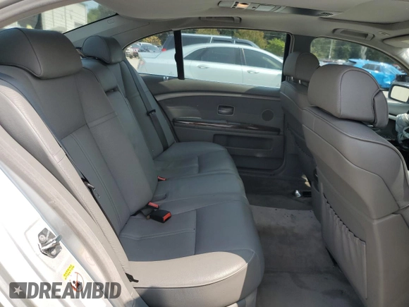 2004 BMW 7 Series 745Li with VIN WBAGN63444DS47664, listed as a Copart auction lot 71046044 with 144,598 mi miles and Salvage title. Bid and sale history available at DreamBid. Image 11.