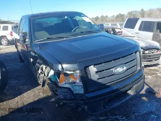 2009 Ford F-150 STX with VIN 1FTRX12WX9FA69251, listed as a IAAI auction lot 41341658 with 169,074 mi miles. Bid and sale history available at carsss.com. Image 1.