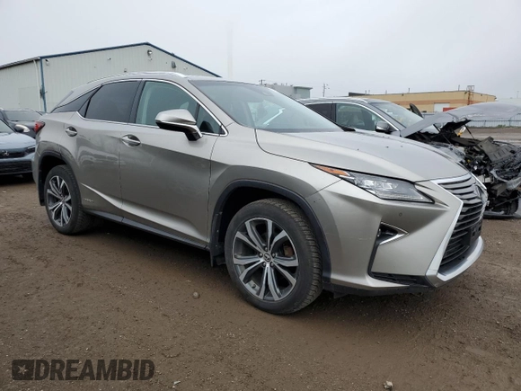 2018 Lexus RX 450h with VIN 2T2BGMCA7JC023729, listed as a Copart auction lot 57952585 with 169,102 mi miles and Clean title. Bid and sale history available at DreamBid. Image 4.