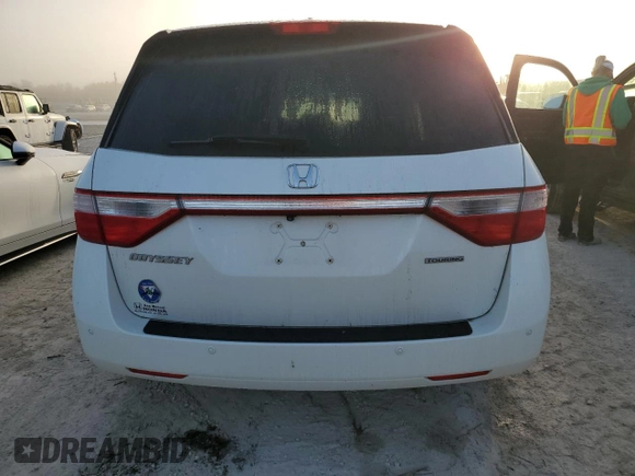 2012 Honda Odyssey Touring with VIN 5FNRL5H96CB144690, listed as a Copart auction lot 75176494 with 0 mi miles and Salvage Title. Bid and sale history available at carsss.com. Image 6.