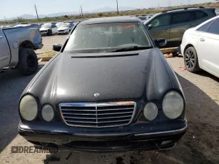 2001 Mercedes-Benz E-Class AWD with VIN WDBJF83J31X058259, listed as a Copart auction lot 74370604 with 131,454 mi miles and Clean Title. Bid and sale history available at carsss.com. Image 5.