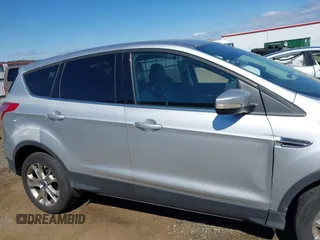 2013 Ford Escape SEL with VIN 1FMCU0H96DUA30733, listed as a IAAI auction lot 42737439 with 106,651 mi miles and . Bid and sale history available at DreamBid. Image 13.