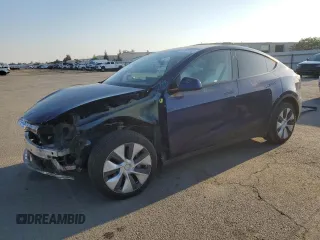 2023 Tesla Model Y Long Range with VIN 7SAYGDEE7PA146322, listed as a Copart auction lot 54071165 with 38,334 mi miles and Salvage Title. Bid and sale history available at DreamBid. Image 1.