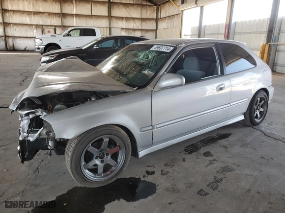1996 Honda Civic DX with VIN 2HGEJ634XTH105568, listed as a Copart auction lot 69697714 with 130,880 mi miles and Salvage Title. Bid and sale history available at carsss.com. Image 1.