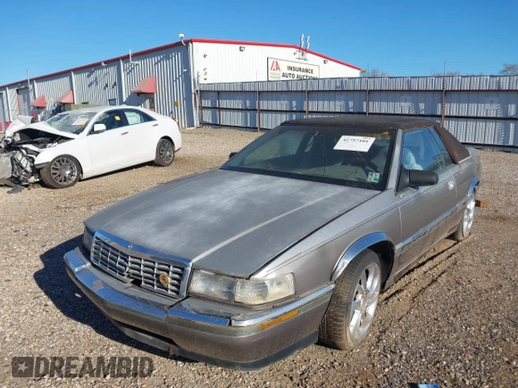 1992 Cadillac Seville z VIN 1G6EL13B2N0612154, wystawiony jako IAAI lot #41757101 z przebiegiem Nie podano mil oraz . Historia ofert i sprzedaży dostępna na DreamBid. Obrazek 12.
