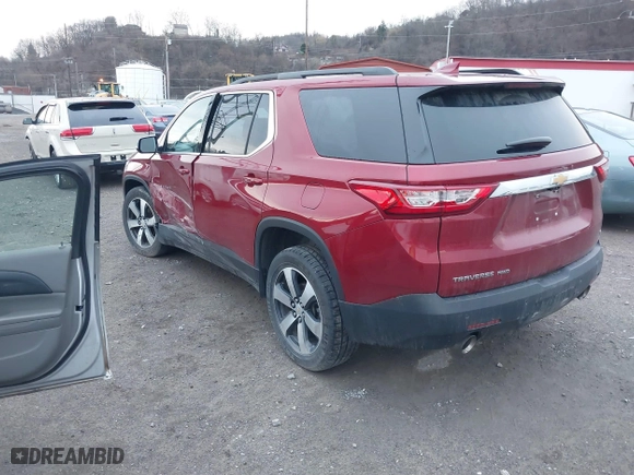 2019 Chevrolet Traverse LT Leather with VIN 1GNEVHKW1KJ164692, listed as a IAAI auction lot 41800874 with 76,866 mi miles. Bid and sale history available at carsss.com. Image 3.