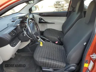 2012 Scion iQ z VIN JTNJJXB0XCJ020404, wystawiony jako Copart lot #62157565 z przebiegiem 82 869 mil mil oraz Nie do naprawy • Non repairable. Historia ofert i sprzedaży dostępna na DreamBid. Obrazek 7.