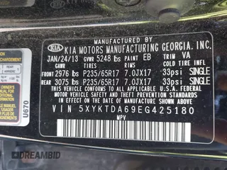 2014 Kia Sorento LX with VIN 5XYKTDA69EG425180, listed as a IAAI auction lot 42125882 with 194,319 mi miles. Bid and sale history available at carsss.com. Image 9.