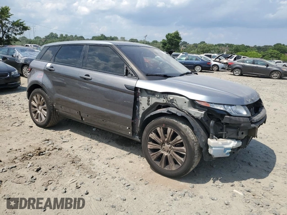 2014 Land Rover Range Rover Evoque Prestige Premium with VIN SALVV2BG5EH950921, listed as a Copart auction lot 57574564 with 151,449 mi miles and Salvage Title. Bid and sale history available at carsss.com. Image 4.
