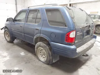 2003 Isuzu Rodeo with VIN 4S2CK58W634308515, listed as a IAAI auction lot 41843174 with 158,748 mi miles. Bid and sale history available at carsss.com. Image 3.